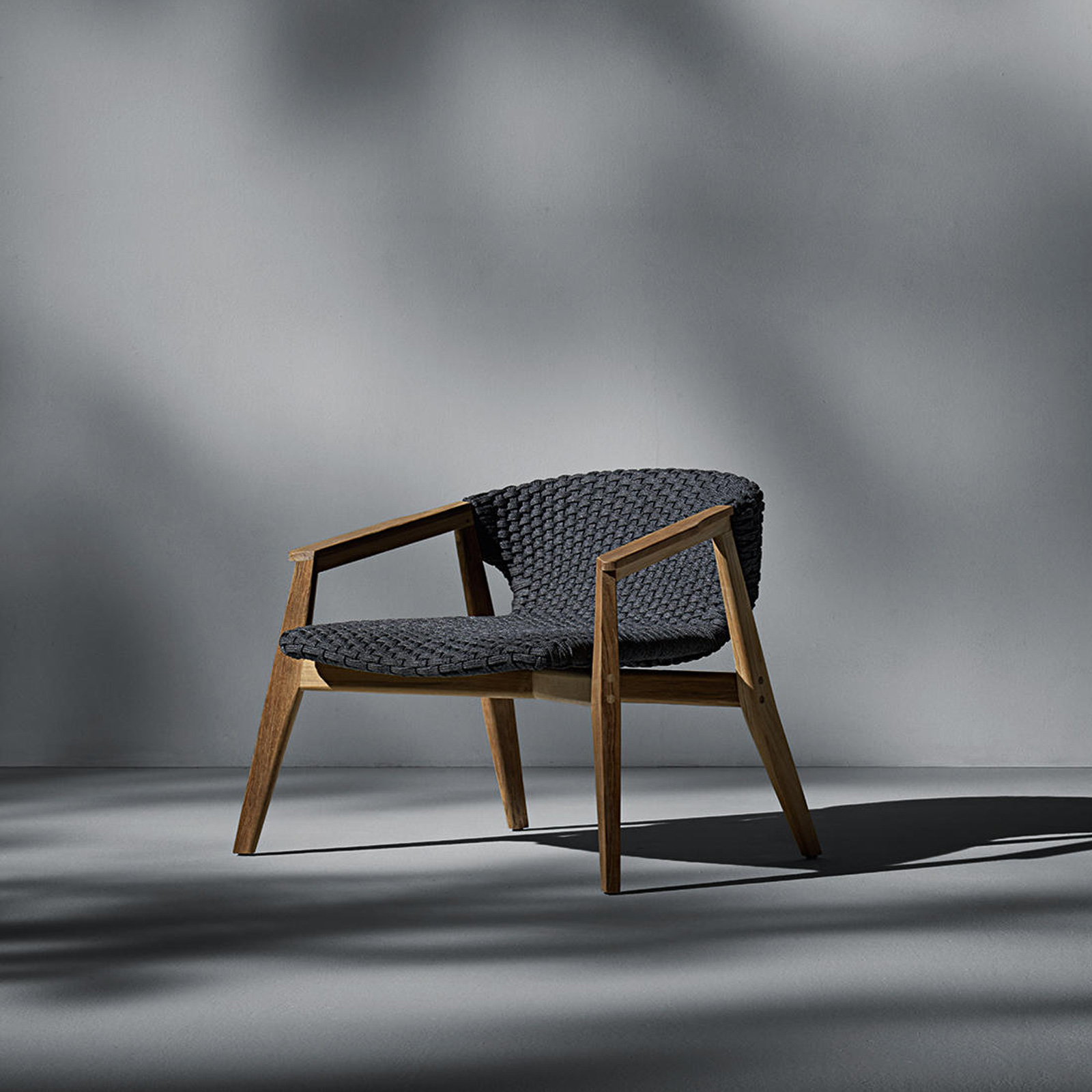 Ethimo's Knit collection lounge armchair.