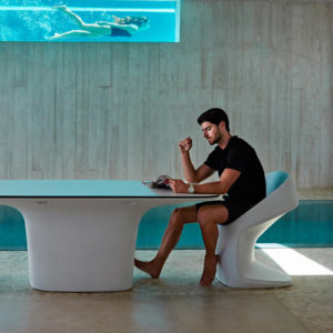 ufo-dining-chair-white-vondom-core-furniture-product-1-1 A UFO dining chair in use.