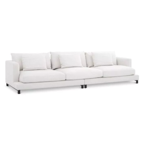 Designer luxurious Sofa Burbury by Eichholtz in avalon white upholstery finish with black feet