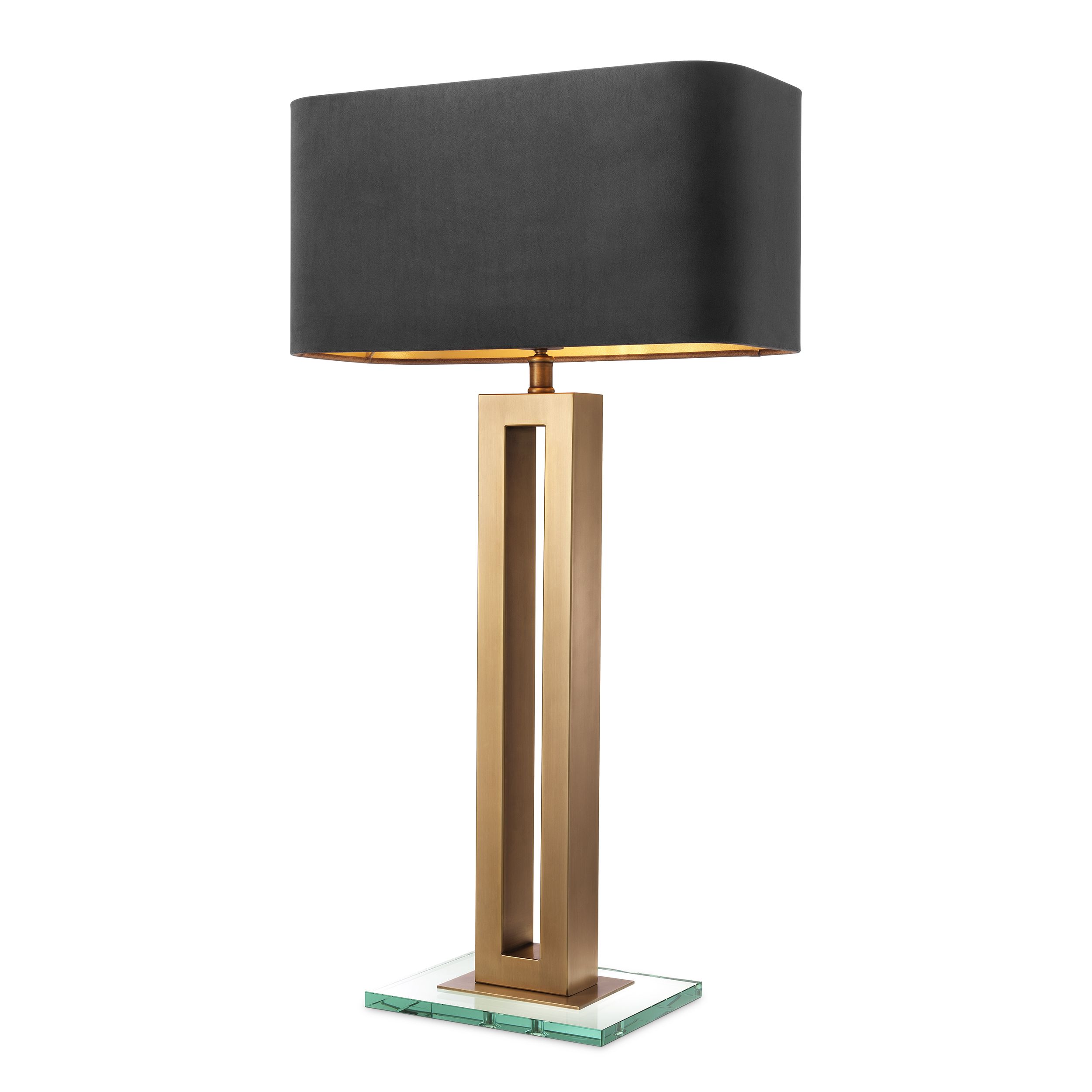 Table Lamp Cadogan by Eichholtz antique brass finish with a clear glass base and grey velvet shade