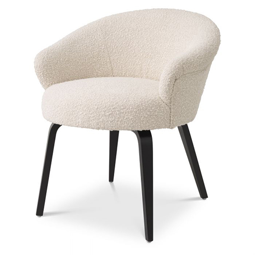 Luxurious Moretti Dining Chair by Eichholtz in boucle cream or mademoiselle beige fabric finishes with black legs