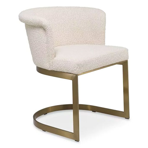 Luxurious Bofinger Dining Chair by Eichholtz in boucle cream finish with brushed brass frame