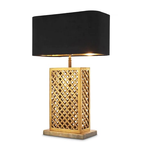 Table Lamp Idyllwild by Eichholtz in a vintage brass finish includes black velvet shade with gold inner