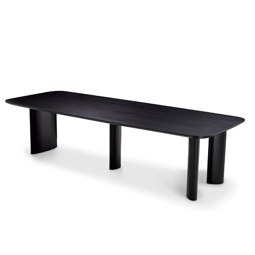 Designer Dining Table Harmonie by Eichholtz in natural oak veneer or black veneer. Features ellipse shaped legs. Rectangular with rounded corners.