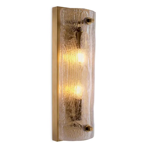 Designer Wall Lamp Lagos by Eichholtz in antique brass finish featuring handmade glass