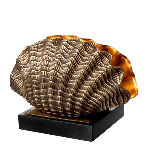 Luxurious Table Lamp Burbank by Eichholtz in vintage brass finish with a black granite base